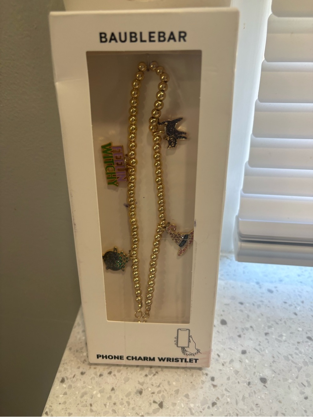 NIB BaubleBar Gold Beaded 'Feelin' Witchy' Charm Phone Wristlet - Gold